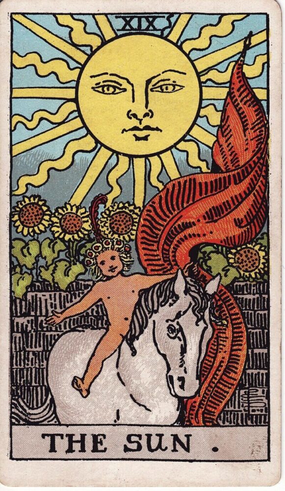 Tarot card The Sun featuring the sunflower symbolizing joy and happiness